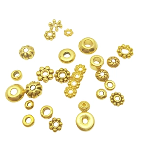 Assorted antique gold snowflake spacer beads and alloy flower charms for DIY jewelry making