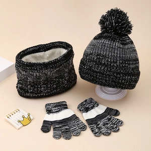 Detail of fleece-lined gradient knit hat, neck gaiter, and gloves set for kids