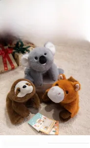 Close-up of soft plush sloth, koala and capybara stuffed animal toys in a cozy home setting