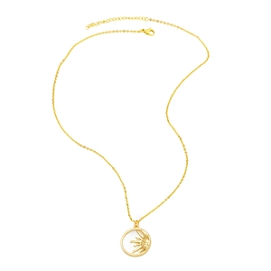 Detailed close-up of golden sun and moon shell pendant necklace with a lobster clasp