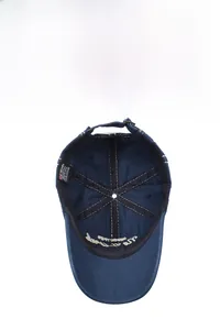 Internal view of the navy blue cotton baseball cap showing neat stitching and wash labels