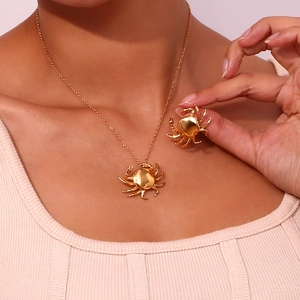 Conjunto de joyas de cangrejo dorado con collar y pendientes de acero bañado en oro