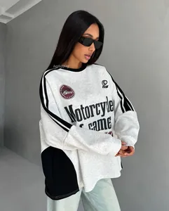 Detail of grey oversized sweatshirt with Motorcycle Game print and raglan sleeve stripes