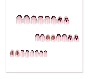 Short round French press-on nails with wine red tips and plum blossom floral details