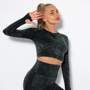 Detail view of seamless acid wash yoga set featuring thumbhole cuffs and ribbed texture