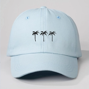 Detailed close-up of light blue cotton baseball cap featuring black palm tree silhouettes