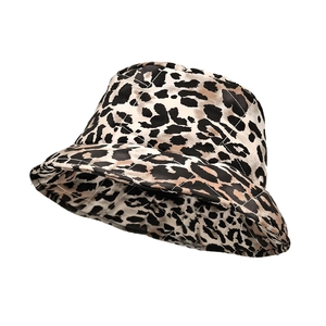 Quilted leopard print bucket hat for women with warm padded fabric and chic wide brim
