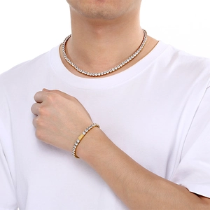 Ensemble collier et bracelet tennis en acier inoxydable doré avec pierres en zircone