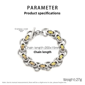 Macro detail of men's stainless steel Byzantine chain with silver rings and gold T-bar clasp