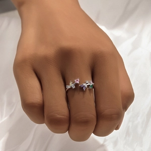 Detail of S925 sterling silver ring with colorful cubic zirconia in heart and leaf design