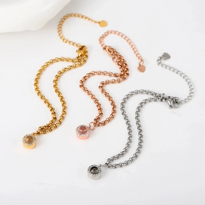 Custom projection necklaces in gold, rose gold, and silver with zircon stone circles