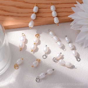 Detailed view of DIY irregular natural freshwater pearl pendants in gold and silver finish