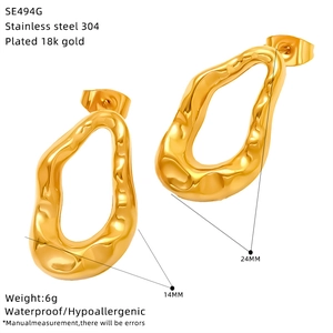 Detail view of 18K gold plated stainless steel hollow earrings with size specifications