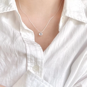Minimalist 925 sterling silver necklace featuring a sparkling round colorful crystal pendant