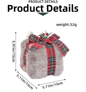 Detailed view of plush Christmas gift box ornament with plaid bow and pine cone