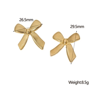 Detail of gold bow earrings showing 26.5mm width and 29.5mm height measurements