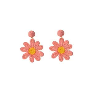 Pink and yellow raffia daisy flower earrings for beach holidays in a woven minimalist design