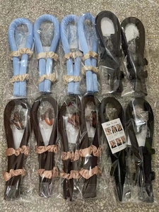 Detail of packaged heatless curling sets with foam rods and clips in various colors