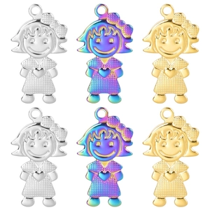 Detail of 18k gold plated girl-shaped charms with bow ties in gold, silver and rainbow colors