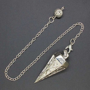 Macro view of silver dowsing pendulum with engraved hexagram patterns and metal chain