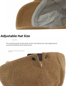 Detail of adjustable brown newsboy cap featuring a metal buckle and premium leather strap