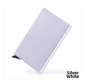Silver aluminum RFID card holder showing the bottom pop-up switch and metallic finish