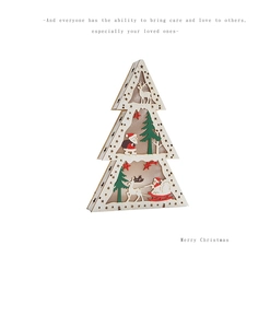 Detailed view of 3D layered wooden Christmas tree light with carved Santa and reindeer motifs