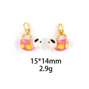 DIY jewelry charm featuring a pink handbag and cute puppy design in gold finish enamel