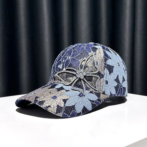 Lace floral baseball cap with rhinestone butterfly detail and elegant embroidery