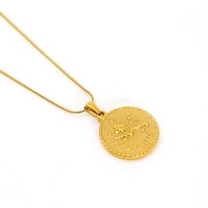 Vintage 18K gold-plated Leo zodiac round pendant necklace with a polished gold chain