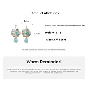 Floral earrings detail with blue glass beads, colorful stones and faux pearls size info
