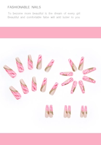 Macro detail of ballerina nails featuring pink marble swirls and gold glitter accents