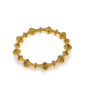 Golden stainless steel spiral spring bangle with a unique spindle texture and elegant design