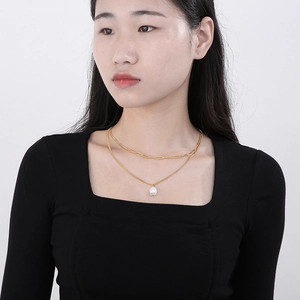 Double-layered gold titanium steel necklace with paperclip chain and pearl pendant