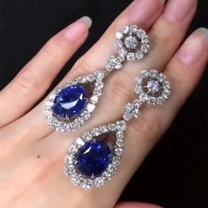 Silver drop earrings with pear-cut deep blue sapphire stones and pave-set zircons