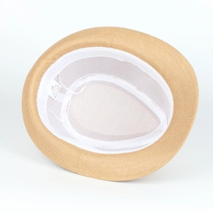 Detail view of the straw fedora inner lining with 100% paper material label and size 58