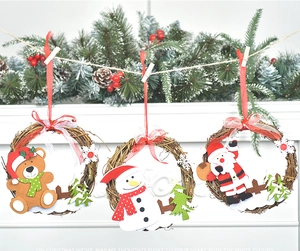 Detailed view of Christmas mini wreaths with plush bear, snowman and Santa on vine loops