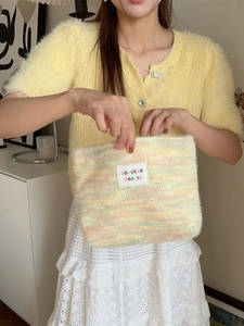 Fuzzy rainbow plush makeup bag with large capacity for travel toiletries and cosmetics