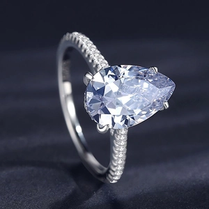 Luxury 925 silver ring featuring a 3-carat pear-shaped diamond with pavé set band