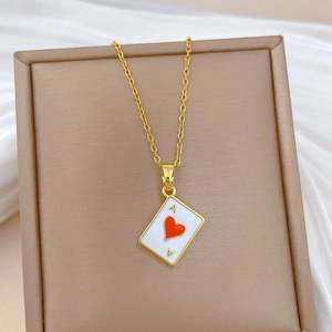 Luxurious gold titanium necklace with ace of hearts pendant on white satin background