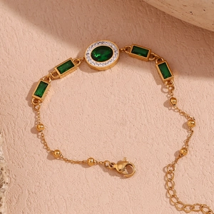 Vintage 18K gold plated stainless steel bracelet with green emerald cut stones and zircon
