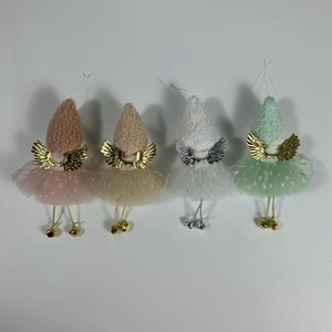 Detailed view of four plush angel ornaments with mesh skirts and metal wings in soft colors