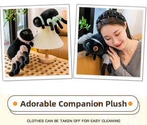 Close-up of plush spider doll with large sparkling eyes and removable clothes
