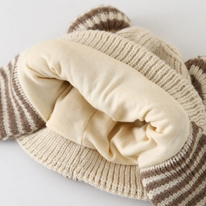 Cozy winter baby knitted hat featuring soft warm lining and cute brown striped ears