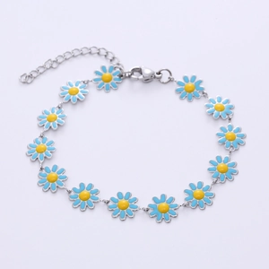 Detail of silver daisy bracelet with blue enamel petals and lobster clasp closure