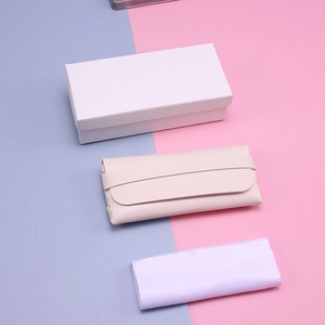 Minimalist beige leather eyewear pouch with rectangular gift box and cleaning cloth set