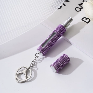 Portable purple rhinestone perfume atomizer bottle with keychain and transparent window
