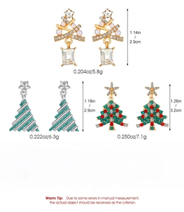 Detailed view of alloy Christmas tree earrings with colorful crystals and pearls