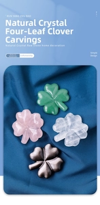 Detailed view of polished four-leaf clover carvings in rose quartz and green aventurine