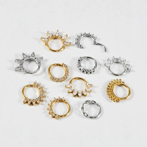 Variety of zircon nose hoops and helix rings in gold and silver stainless steel